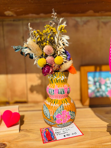 Small floral vase with dried arrangement